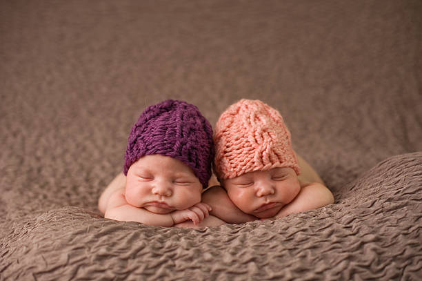 istock Sleeping Twin Newborn Girls 163716365