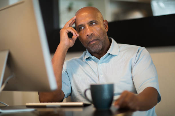 istock Mature African American man looking frustrated. 1637211522