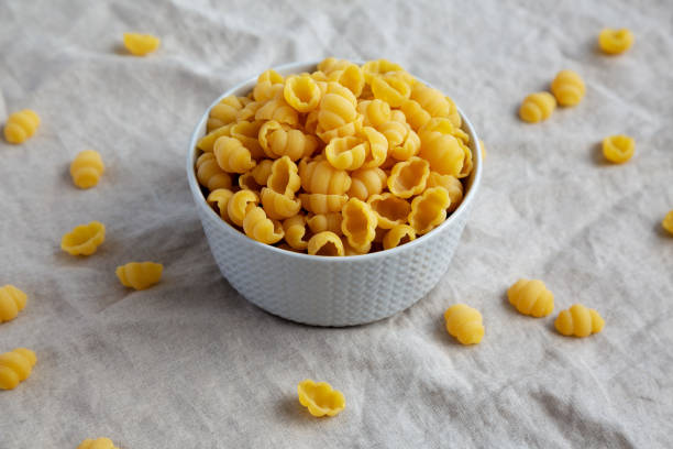 istock Dry Organic Gnocchi Pasta in a Bowl, side view. 1637251989