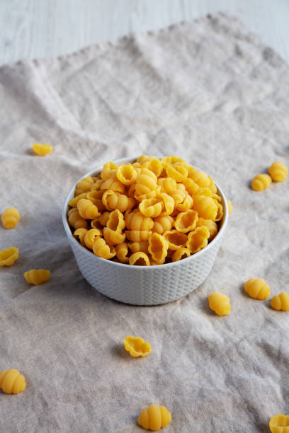 istock Dry Organic Gnocchi Pasta in a Bowl, side view. 1637251997