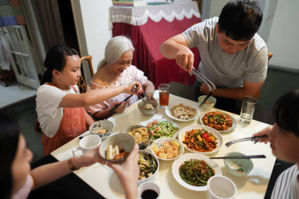 istock happy family having lunch together 1637257252