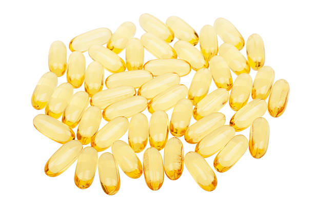 istock Pile of fish oil capsules 163728057