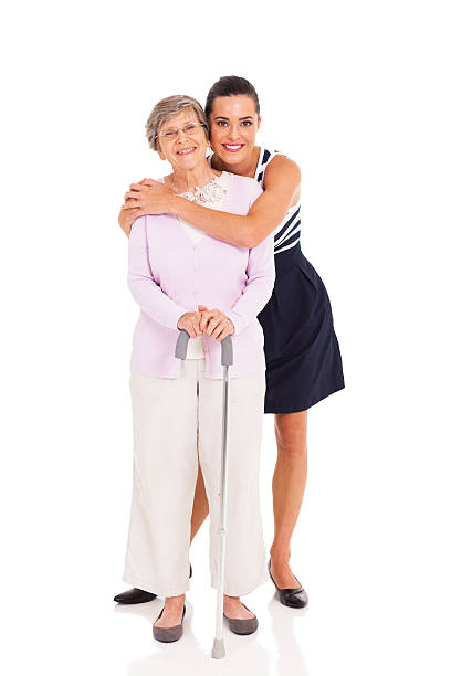 adulto granddaughter y jubilados abuela - grandmother standing senior women senior adult fotografías e imágenes de stock