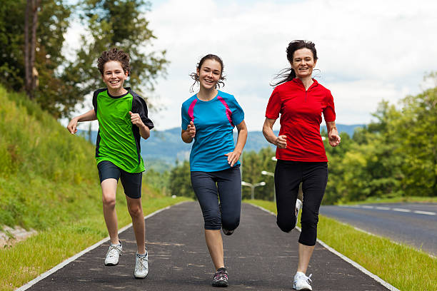 istock Mother with kids running outdoor 163728498