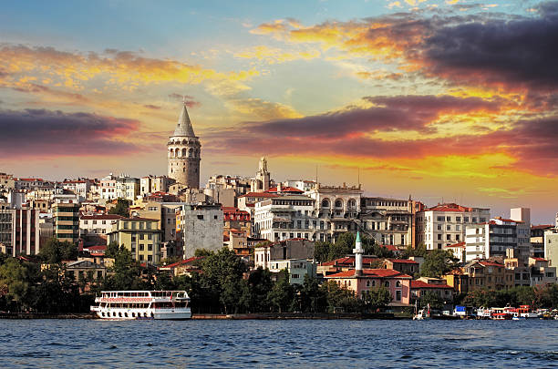 A sunset in Istanbul at Galata district, Turkey Istanbul at sunset - Galata district, Turkey golden horn istanbul photos stock pictures, royalty-free photos & images