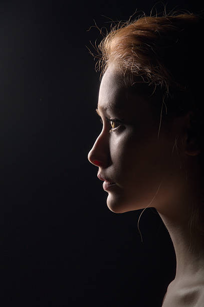 istock profile of young pensive woman 163730513