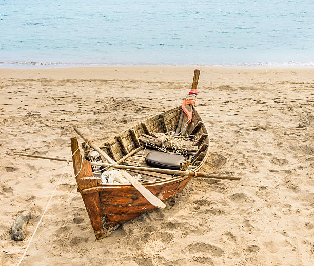istock Old beached fishing Boat - Asian Style 163732087
