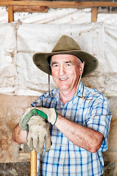 istock Senior farmer portrait with big smile 163732293