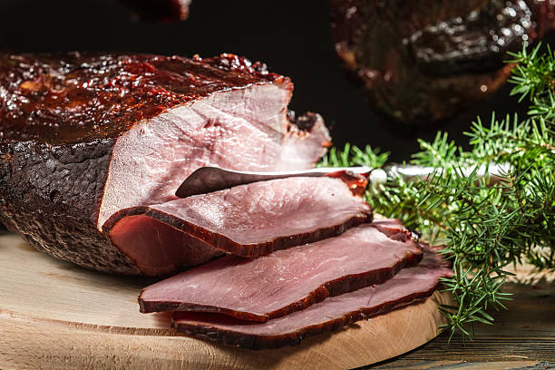 istock Closeup of a sliced piece smoked ham 163735822