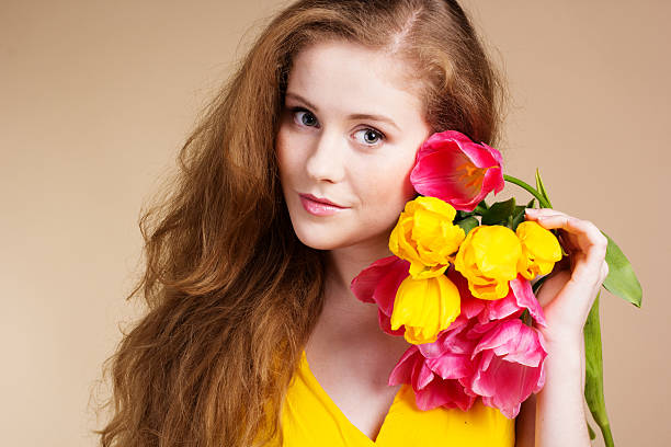 istock girl with tulips 163736452