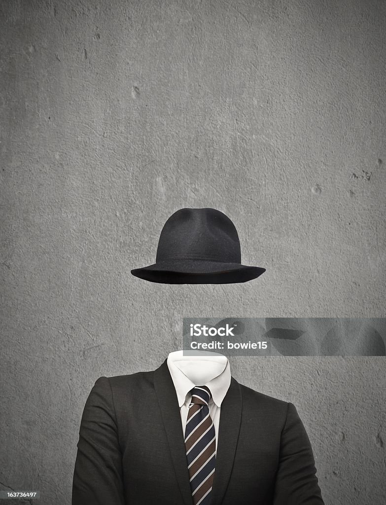 Drawing of an invisible man wearing a suit and hat invisible businessman with hat on gray background Invisible Stock Photo