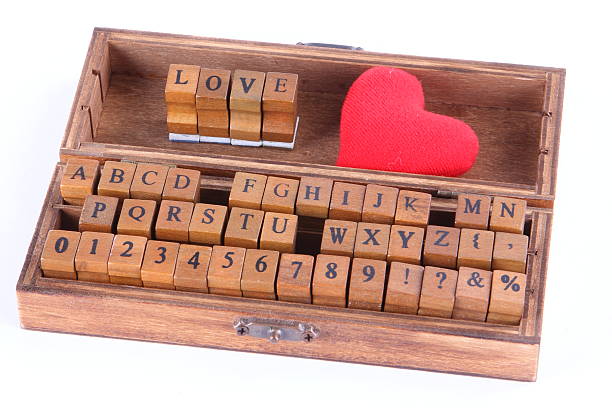 istock Love written in wood stamp letters 163736743