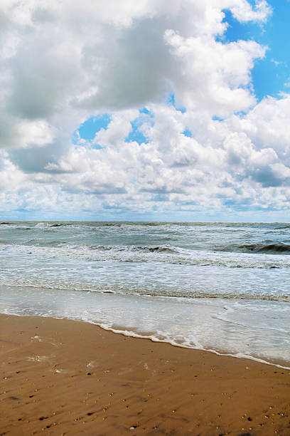 istock Cloudy sky over the stormy sea 163738812