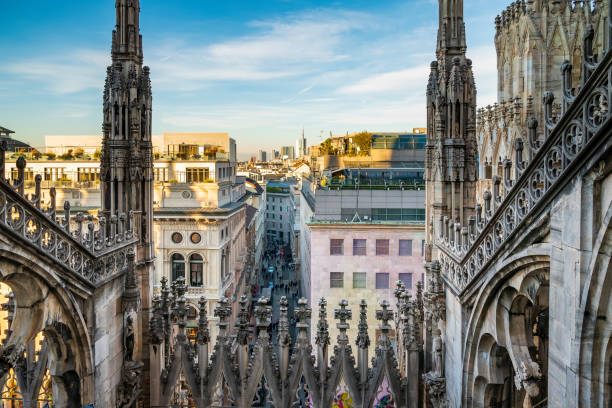 istock View from Milan Cathedral rooftop. In addition to figurative sculptures, the facade incorporates intricate floral and decorative details. 1637407086