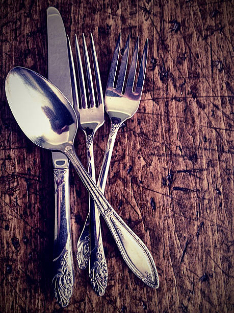 istock Rustic and country antique silverware on a wooden background 163742967