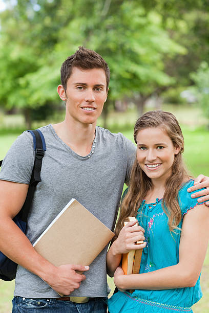 istock Student holding his girlfriend by the shoulder 163743033