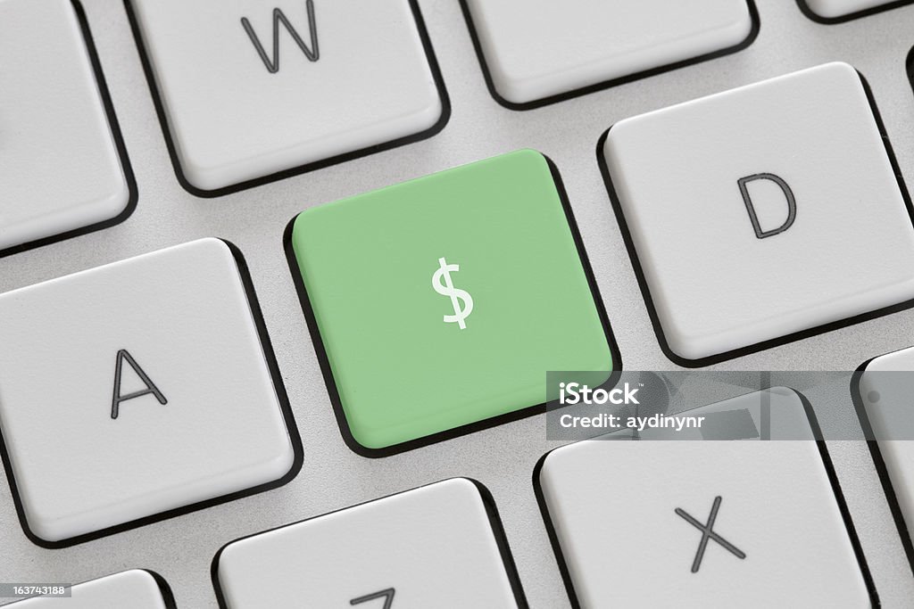 Naciśnij zielony przycisk na pieniądze - Zbiór zdjęć royalty-free (Alfabet)