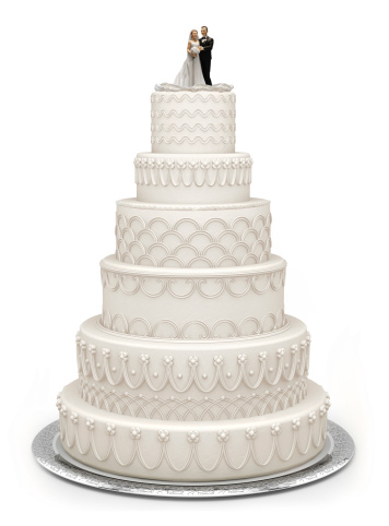 Traditional six layer wedding cake isolated on white with a clipping path