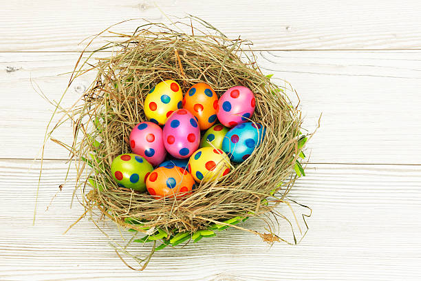 Nest full of colorful Easter Eggs stock photo