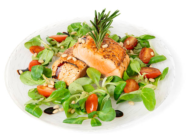 istock Rare fried salmon steaks isolated on white 163748548