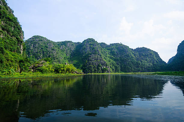 istock Limestone cliffs. Tam Coc Grotto, Ninh Binh Province, Vietnam 163749102