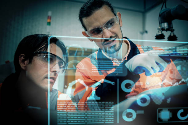 istock Multiracial tachnicial engineer training with robot arm 1637503838