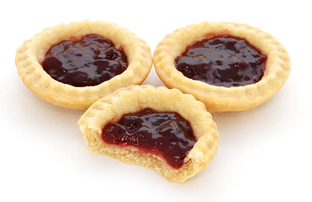 istock Three jam tarts, one with a bite taken 163751413