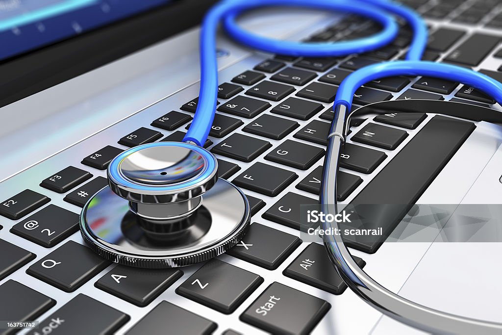 Stethoscope on laptop keyboard See also: Healthcare And Medicine Stock Photo