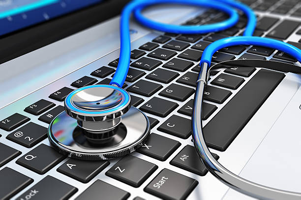 Stethoscope on laptop keyboard See also: debugging photos stock pictures, royalty-free photos & images