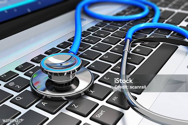 Stethoscope On Laptop Keyboard Stock Photo - Download Image Now - Healthcare And Medicine, Repairing, Computer