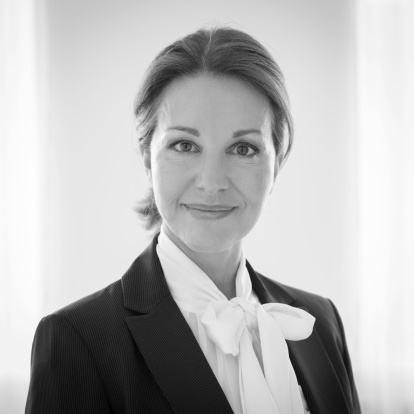 Smart businesswoman headshot portrait in black and white.