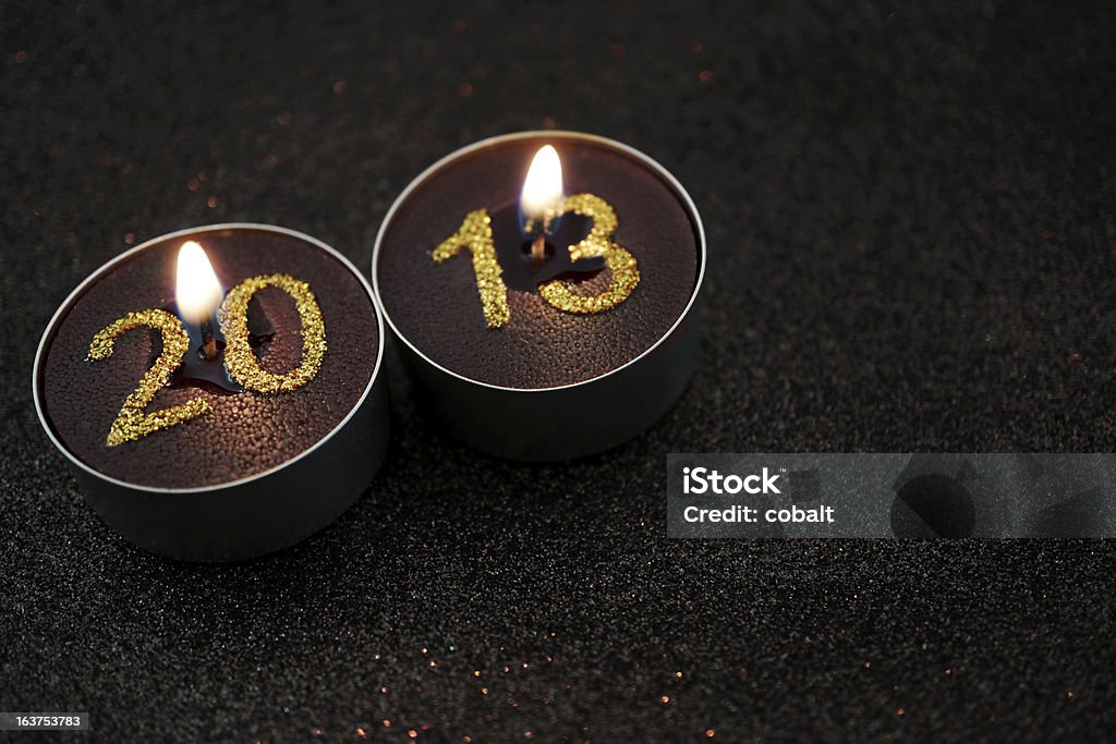 New Year Candles 2013 Small tea lights with gold glitter 2013 number 2013 Stock Photo