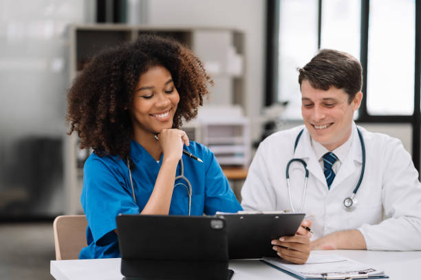 istock Medical team working on digital tablet healthcare doctor technology tablet using computer analyzed the results of medical reports at the hospital. 1637540016