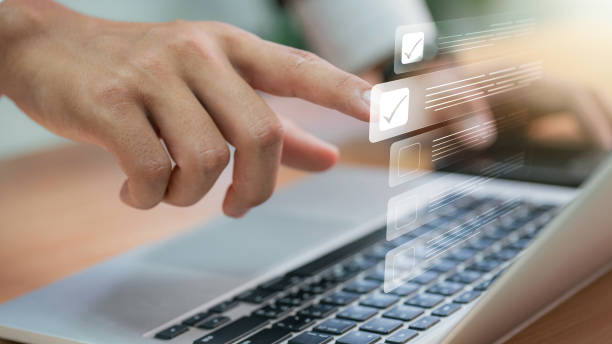 istock Document Management System (DMS) concept. Businessmen checklist, managing and access information in online exam standards and document Control for company database access 1637549885