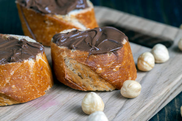 istock chocolate butter spread on a baguette, close up 1637557515