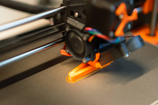 istock Working fast 3d printer 3d. Fan and extruder close up. 1637558126