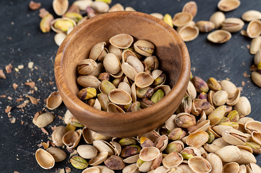 peeled fresh crunchy pistachios, green nuts pistachios without shells