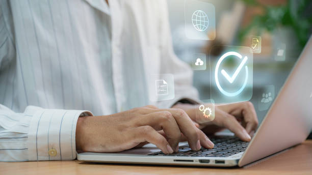 istock Businessmen point to tick correct sign mark in checkbox for approve quality document and project control. Excellence in document correction, ensuring quality and ISO certification for top Service 1637560426