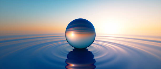 istock Glass sphere in calm ocean 1637579643
