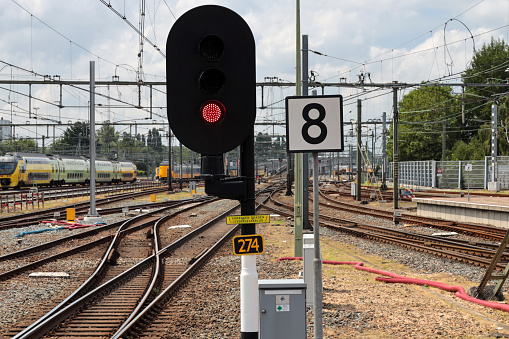 Red light signs with speed limit (8 means 80) at the Rotterdam central station in the Netherlands