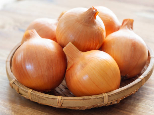 istock Fresh onions in a basket 1637610796