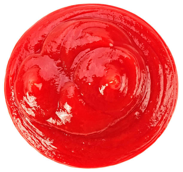 istock Tasty tomato ketchup isolated on a white background, top view. 1637629079