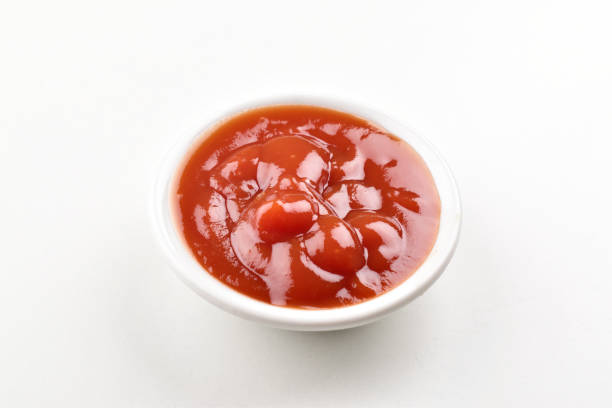 istock Closuep of ketchup dip on white background 1637670676