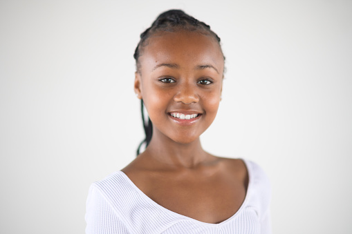 Young and Beautiful African Girl Studio Smiling Headshot