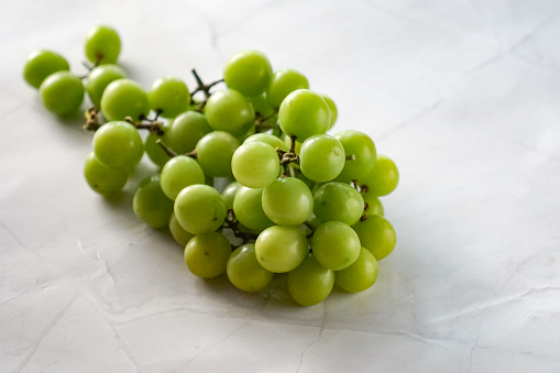 Green grape on white background.  Shine muscat grape.