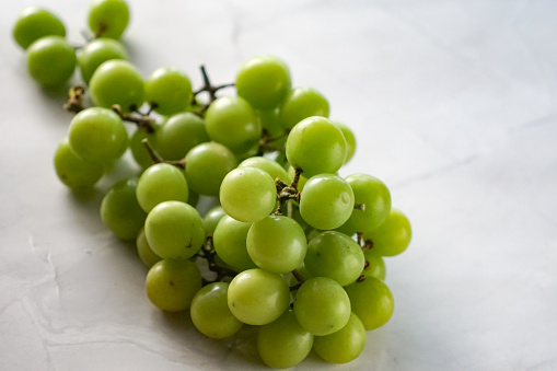 Green grape on white background.  Shine muscat grape.