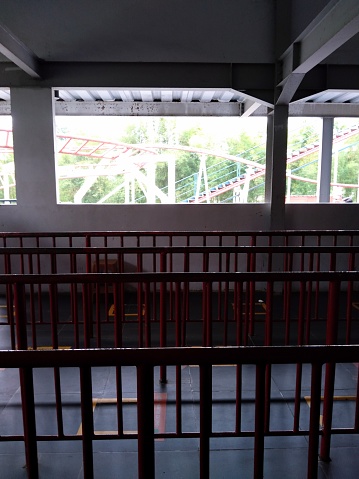 iron fence that serves to regulate the line of queues of visitors who will ride the roller coaster