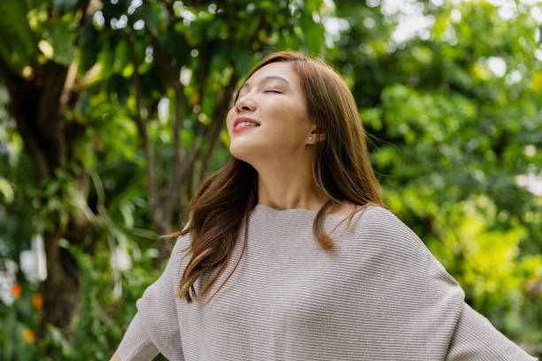 istock People enjoy nature in a park. 1637710820