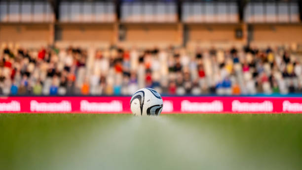istock Football on grass 1637717308