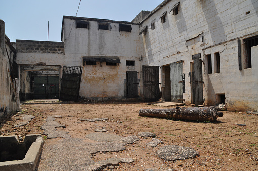 An ancient cannon in the abandoned prison in the former Ussher Fort in Accra, Ghana.